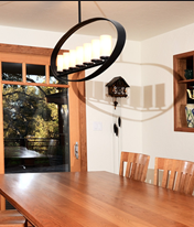 Cherry millwork integrates the dining furniture and surrounding architecture. Dining room photos by Peter R. Taft Photography.