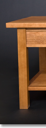 Another cherry coffee table designed by J.T. John.