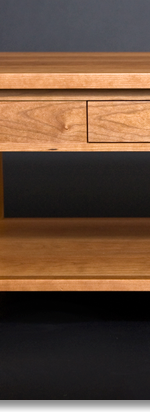 Another cherry coffee table designed by J.T. John.