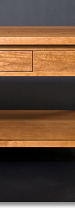 Another cherry coffee table designed by J.T. John.
